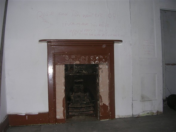 Photo:Metal work stolen from the fireplace.