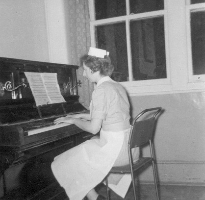 Photo:Sheila or Audrey playing the piano