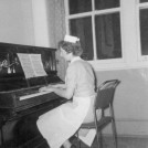 Photo:Sheila or Audrey playing the piano